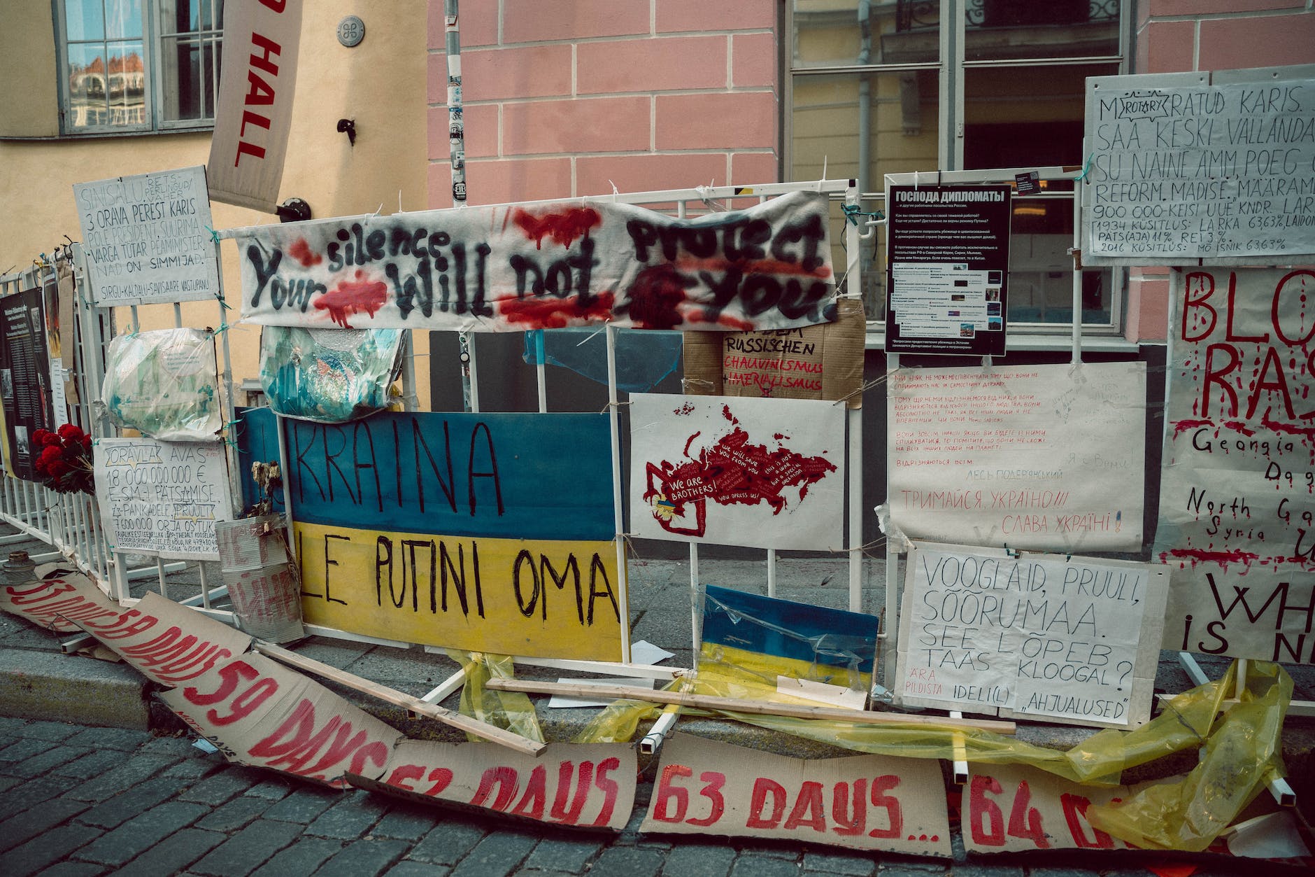 anti war messages on a fence